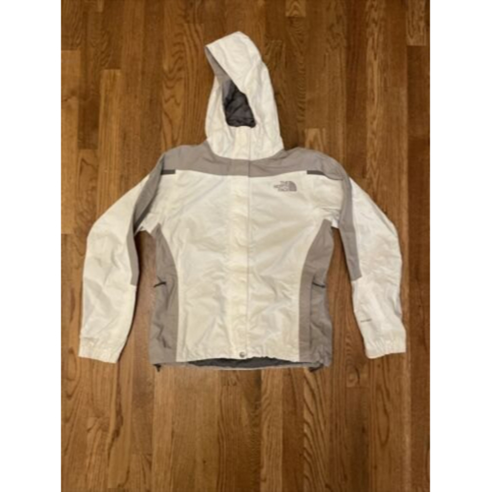 Women’s size small white Northface rain jacket. Zip up. With hood